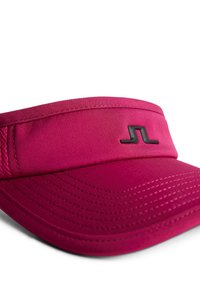 Visiera sportiva rosa con ampio visiera, dotata di un logo nero, tessuto liscio e cuciture dettagliate lungo i bordi. Pannello in rete per ventilazione.