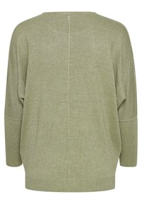 Zelený pletený oversized svetr s kulatým výstřihem, kleslými rameny a středovým švem na zadní straně. Měkká textura a volný střih.