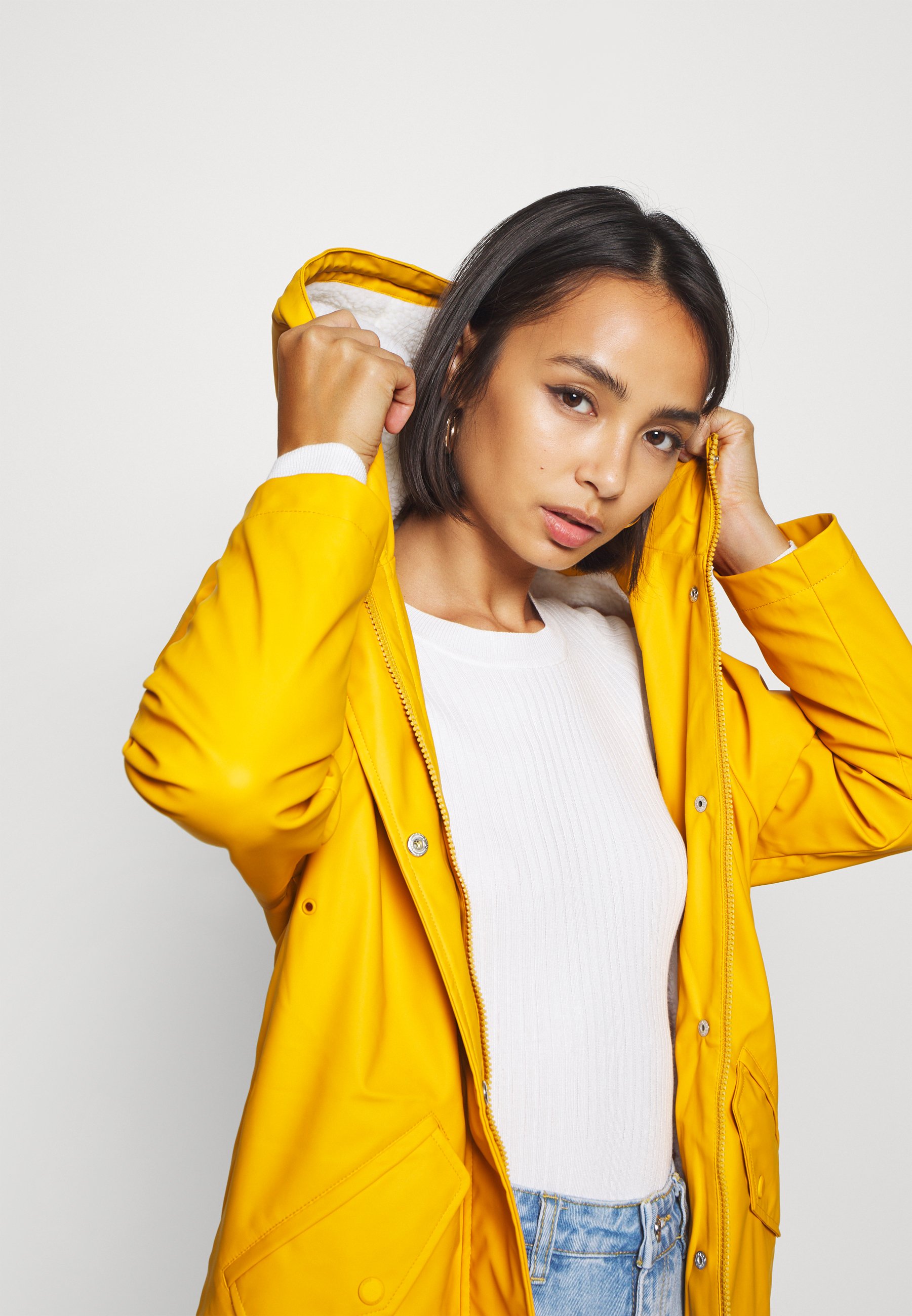 petite yellow raincoat