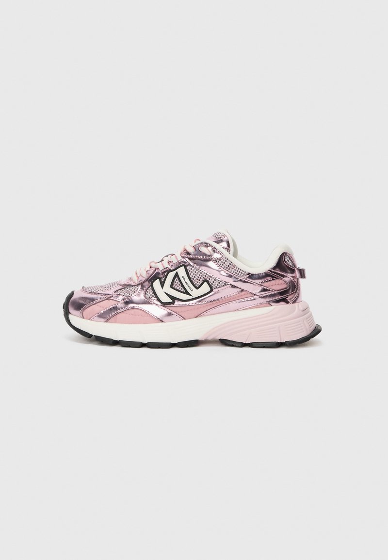Sneakers with a metallic pink upper, black accents, white sole, and prominent logo. Features mesh panels and a padded collar for comfort.