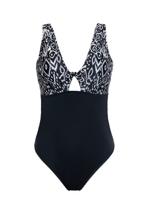 Én-dels badedragt i sort med en mønstret sort og hvid overdel. Har en dyb V-hals, nøglehulskæring og en glat, ensfarvet sort underdel.