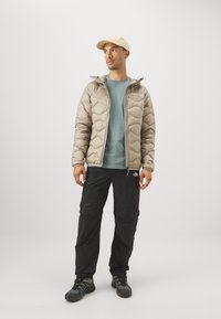 Peak Performance HELIUM HOOD - Chaqueta de plumas - avid beige