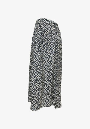 Jupe longue avec motif abstrait de feuilles noires et blanches et taille élastique, présentée sur un fond blanc.