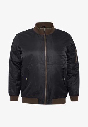 Granatowa kurtka bomberka z brązowym prążkowanym kołnierzem i mankietami, z zamkiem błyskawicznym z przodu oraz bocznymi kieszeniami. Gładki materiał o minimalistycznym designie.