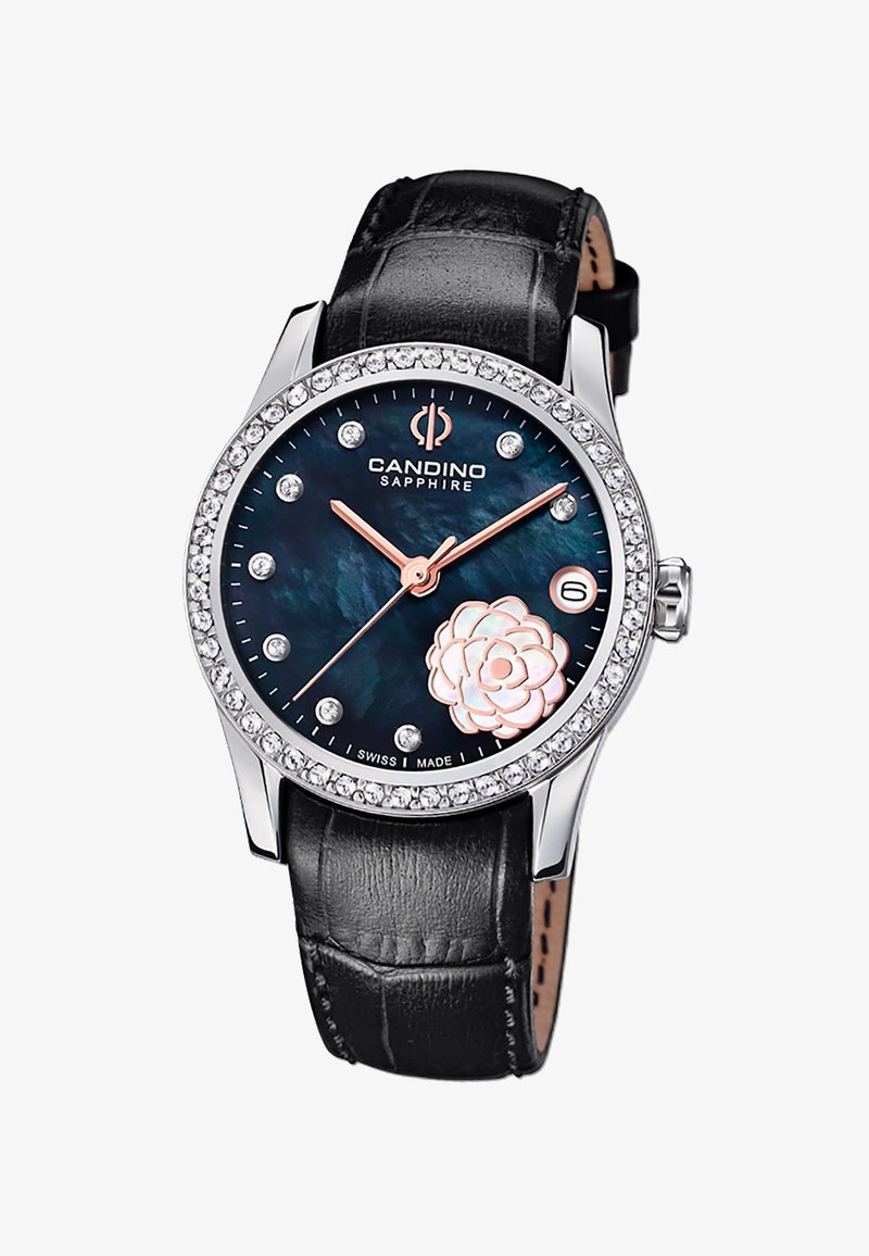 Rose gold-tone watch with a black leather strap. Dark blue dial features a floral design, crystal accents, and silver hour markers. Sapphire glass.
