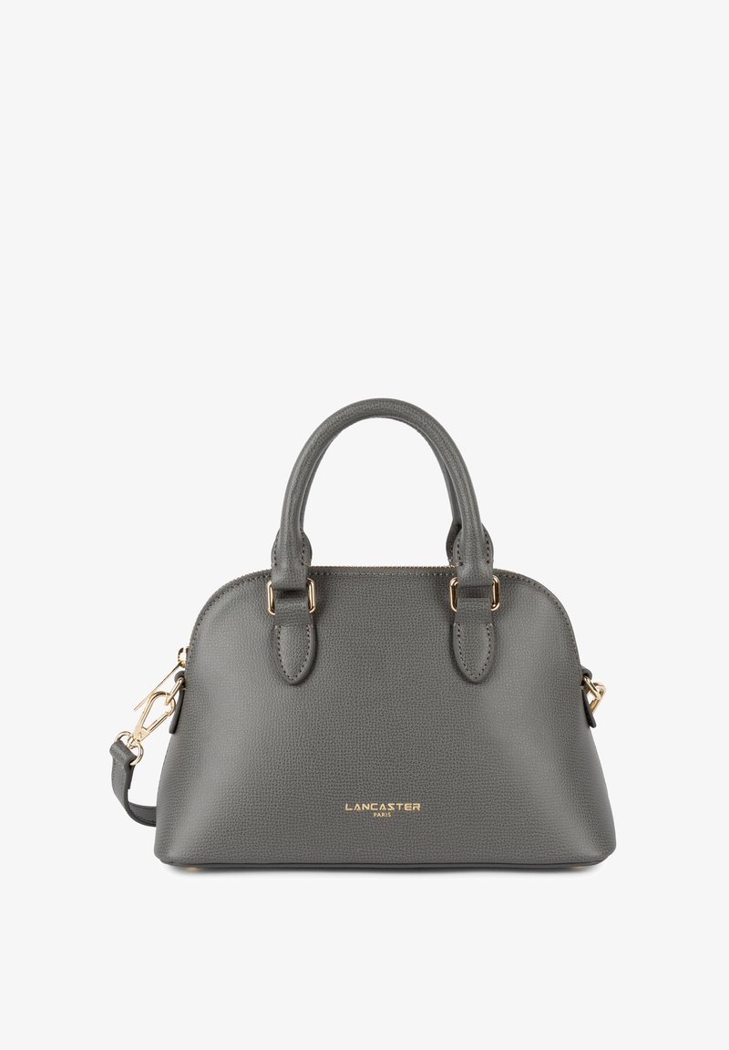 Grijze lederen handtas met textuur, ronde bovenkant, dubbele handvaten, een afneembare schouderband en gouden hardware-accenten. Bevat het merklogo aan de voorkant.