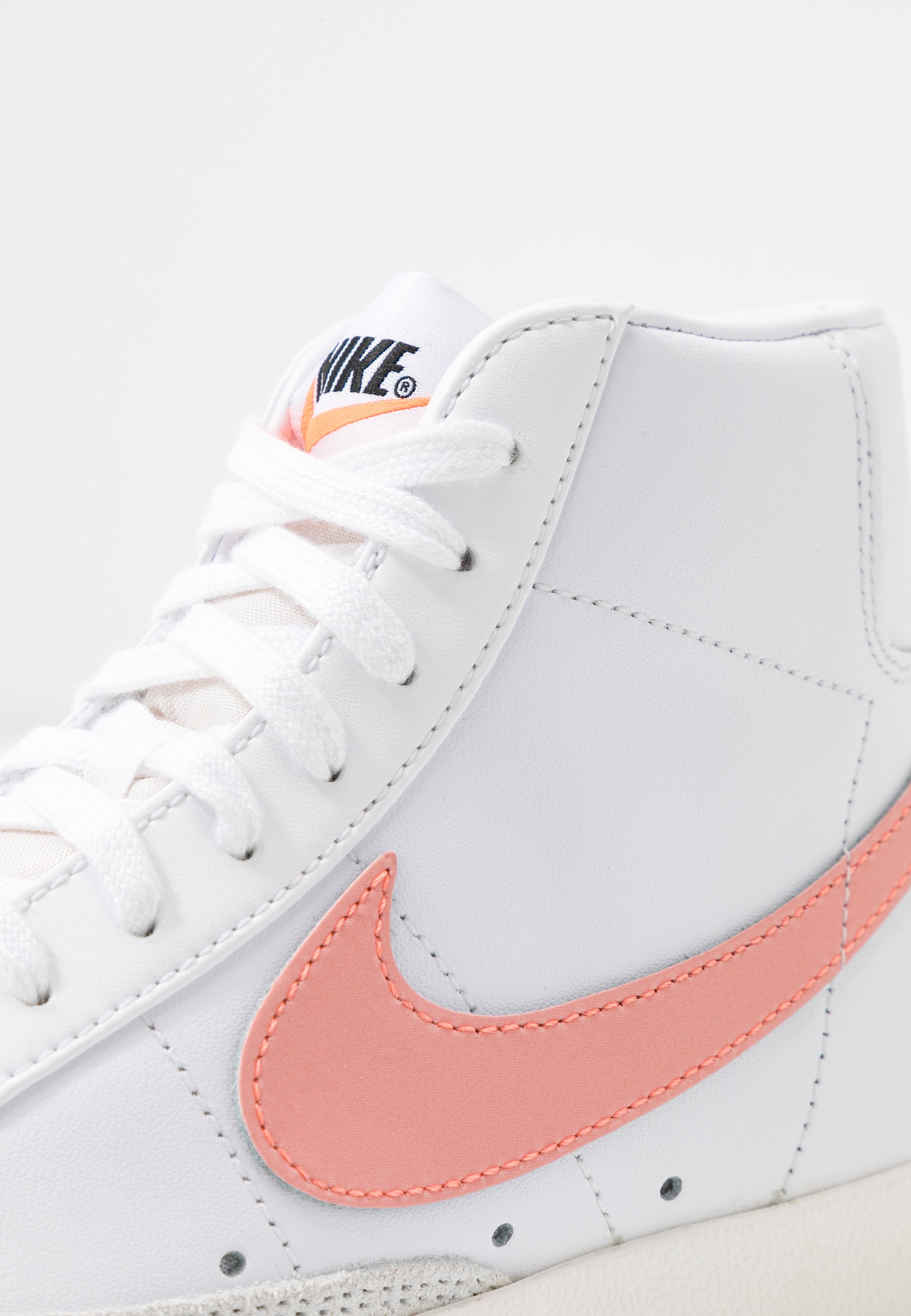 orange and white nike high tops