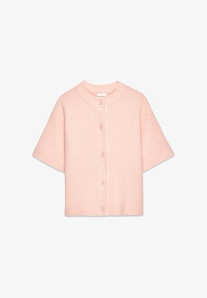 Kratka rokava, gumbna jopica iz mehkega, rebrovanega, svetlo rožnatega materiala. Ima okroglo ovratnico in pet usklajenih gumbov spredaj.