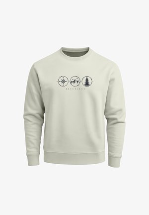 Light gray sweatshirt with ribbed cuffs and neckline. Features a central graphic with a compass, mountains, and a tree icon.