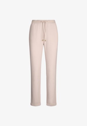 Pantaloni jogger color beige chiaro realizzati in tessuto morbido, dotati di una cintura elastica con cordino e dettagli in metallo dorato.
