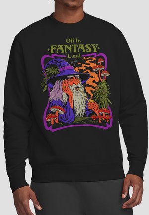 Zauberer mit langem weißem Bart und lila Hut, der eine Pfeife raucht, umgeben von roten Pilzen und grünen Pflanzen, mit dem Text "Ab ins Fantasieland."