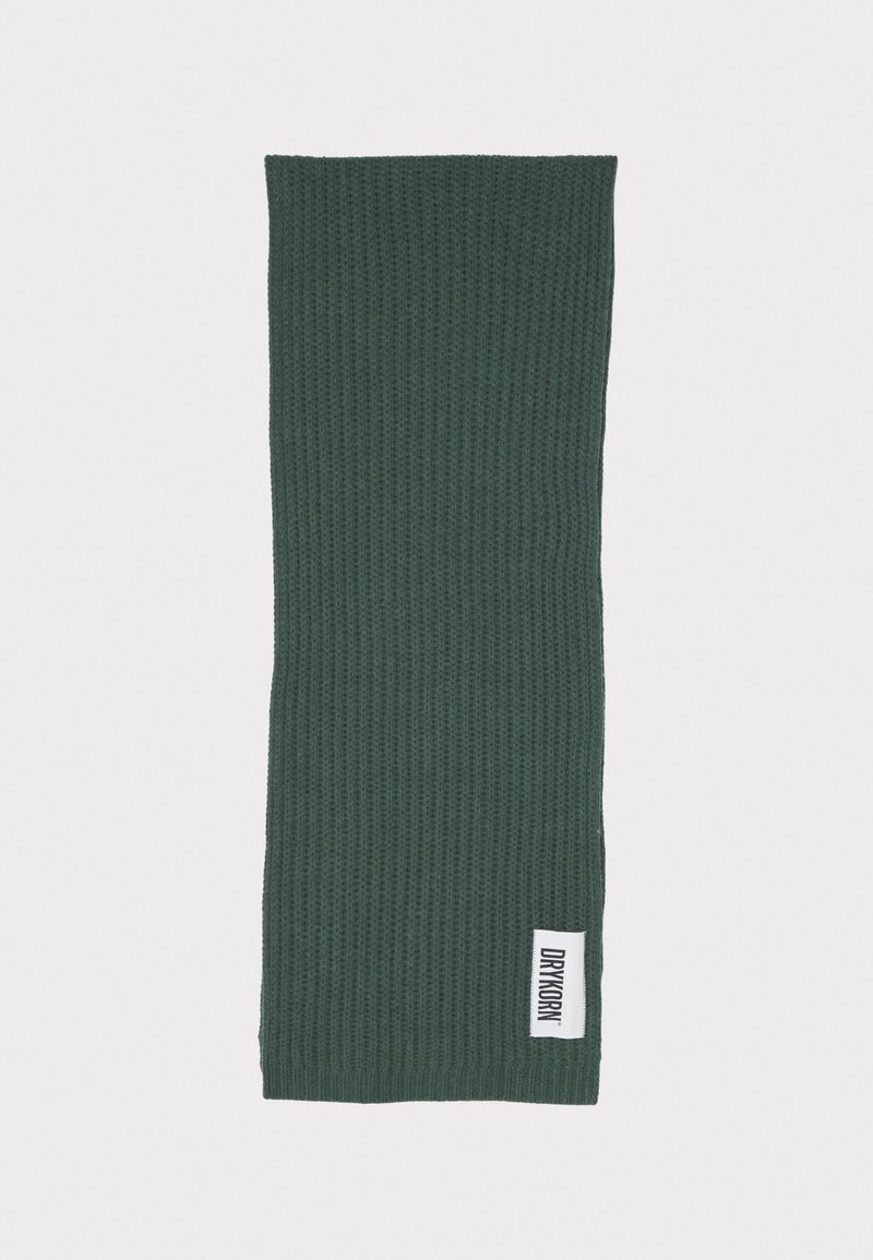 Green ribbed scarf made of textured fabric; features a small label on the side with "DRYKORN" in white text.