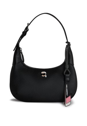 Black leather handbag with a textured finish, a curved shape, top zipper closure, and a decorative logo tag featuring a character design.