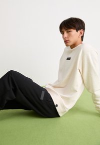 Ellesse MACCHIE - Tréningruha alsók - black