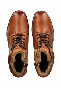 Braune Lederboots bis zum Knöchel mit schwarzen Schnürsenkeln, Futter aus Kunstfell, runder Zehenform und gestickten Akzenten. Mit Reißverschlussöffnung an den Seiten.