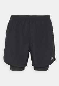 Schwarze Sportshorts mit elastischem Bund und innerer Kompressionsschicht. Mit silbernem Logo auf der unteren linken Seite. Weiches, leichtes Material.