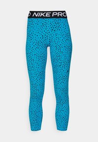 Leggings turchesi con motivo a pois neri, caratterizzati da una ampia vita nera con il testo "NIKE PRO". Il materiale sembra elasticizzato.