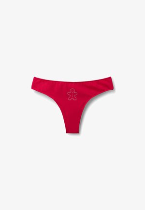 String rouge en tissu doux avec un motif de bonhomme en pain d'épice orné de petits strass au centre avant.