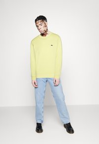 Lacoste UNISEX - Felpa - yellow