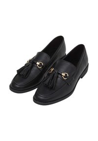 Mocassini in pelle nera con dettaglio a nappina, accessori in metallo dorato, punta rotonda e superficie liscia. Cuciture minime e design con tacco basso.