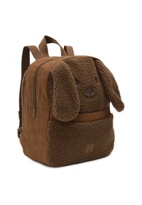 Bruine pluche rugzak met een hondenontwerp. Heeft fluffy oren, een ritssluitende hoofdcompartiment en een voorvak met een gestructureerde afwerking.