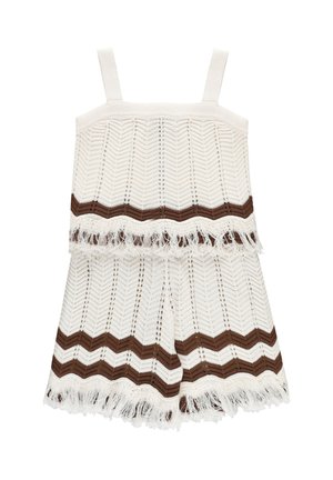 Tutina senza maniche in maglia crema e marrone con motivo a spina di pesce e rifiniture a frange sulla parte superiore e sui pantaloncini.
