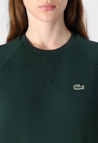 Lacoste Mikina - sinople