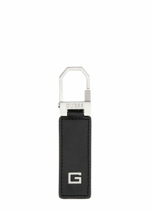 Porte-clés en cuir noir avec emblème argenté "G" et fermoir en métal gravé du nom de la marque "GUESS".