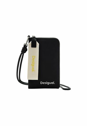 Portefeuille noir zippé avec une étiquette en tissu portant "Desigual" en doré, des accents en cuir et un design slim avec une bandoulière.