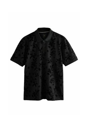 Polo noir avec motif floral, fermeture éclair et manches courtes. Fabriqué en tissu lisse avec un design texturé.