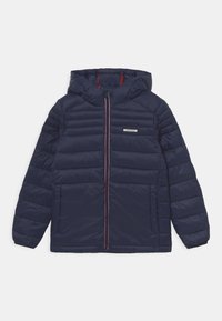 Navy puffer jacket with a hood, featuring a zip front, red accents, quilted design, and two front pockets. Lightweight and insulated.
