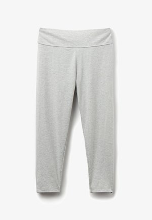 Leggings gris clair en matériau doux et extensible, avec une large taille, présentant une texture lisse sans motifs ni accessoires visibles.