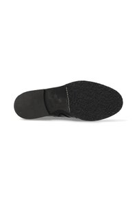 Suela de zapato negra con una superficie de goma texturizada, diseño plano, bordes suaves y minimalismo en los detalles. Construcción duradera, adecuada para varios terrenos.