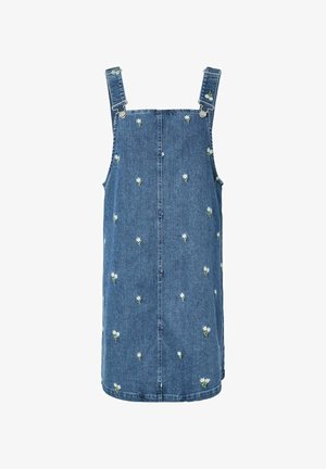 Vestido pichi de denim azul con estampados pequeños de margaritas blancas, tirantes ajustables y cierres con hebillas metálicas.