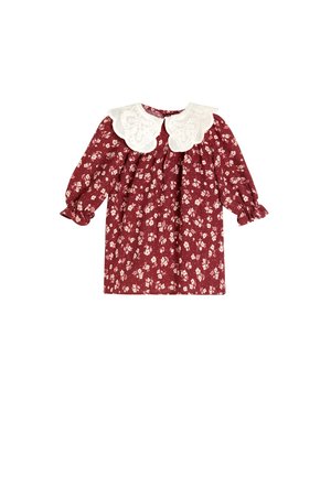 Vestido floral burdeos con cuello blanco festoneado, mangas largas y puños fruncidos. Presenta pequeñas flores blancas sobre un fondo texturizado.