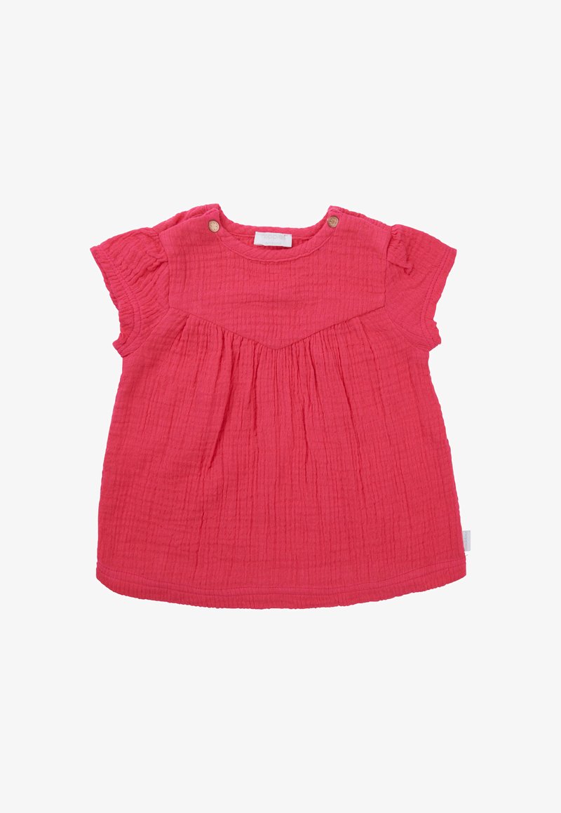 Różowa bawełniana bluzka z krótkimi falbaniastymi rękawami, marszczonym przodem i dwoma dekoracyjnymi guzikami w pobliżu dekoltu. Teksturowana tkanina.