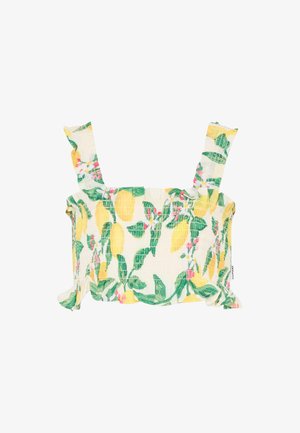 Haut court à smocks avec larges bretelles, présentant un motif de citrons jaunes et de feuilles vertes sur fond blanc.