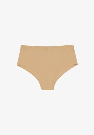 Beige high-waisted underwear with a smooth texture and the phrase "MOVE YOUR SOUL" embossed in a matching color along the waistband.