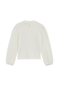 Balts puloveris, izgatavots no mīksta auduma, ar garām pūkainām piedurknēm, apaļu kakla izgriezumu un mazu atslēgas caurumu aizmugurē ar pogas aizdari.