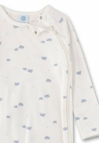 Body in tessuto bianco per bambina con motivo di elefanti azzurri, presenta una zip laterale e bottoni a pressione vicino al collo per facilitare il cambio.