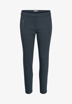 Sötétkék, slim-fit nadrág puha anyagból, cipzáras oldalzsebekkel, övbújtatókkal és sima felülettel. Nincsenek látható jelölések vagy minták.