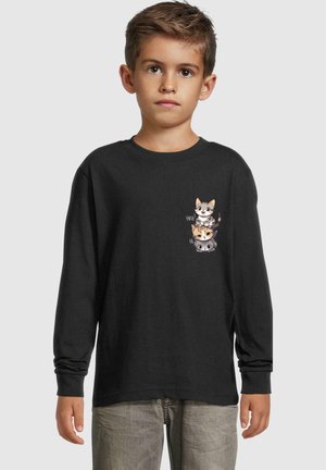 Zwarte longsleeve t-shirt met een kleurrijke kattenafbeelding op de borst. Gemaakt van katoen, met een ontspannen pasvorm en geribbelde boorden.