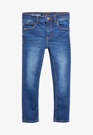 Niebieskie jeansy damskie skinny z przednimi kieszeniami, szlufkami na pasek i zapięciem na guzik, z delikatnym wyblaknięciem na udach.