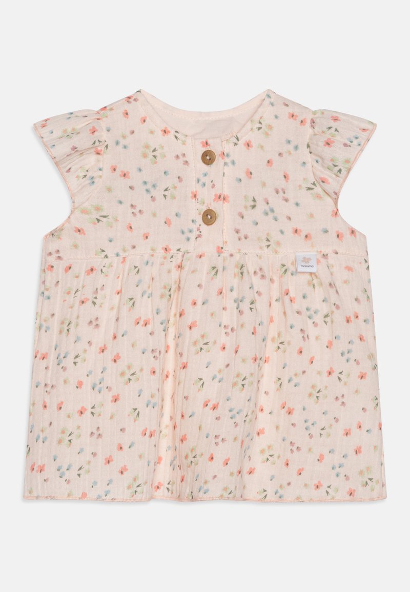 Floral children's dress in light peach with small blue, pink, and green flowers. Features a round neckline and wooden buttons at the front.