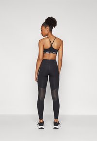 Nike Performance FAST 7/8 - Leggings - black/white