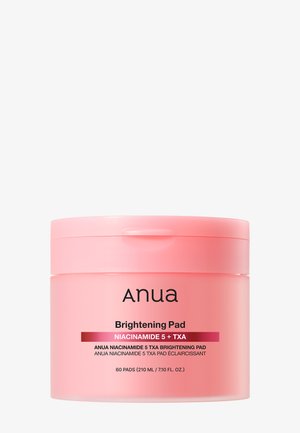 Różowy słoik Anua Brightening Pad z Niacynamidem 5 + TXA, zawierający 60 płatków, 210 ml (7,10 fl. oz.), na białym tle.
