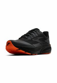 Scarpe da corsa da uomo in nero e arancione. Presentano un upper in rete, suola ammortizzata e battistrada testurizzato per una maggiore aderenza. Lacci neri con accenti riflettenti.