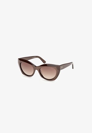 Brown cat-eye sunglasses with gradient lenses and thick glossy frames, angled to show both lenses and arms.