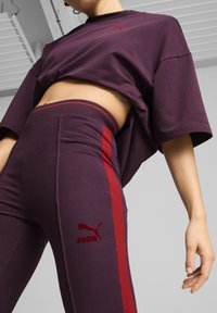 Puma PLAY.PARIS. FLARED - Nadrágok - midnight plum
