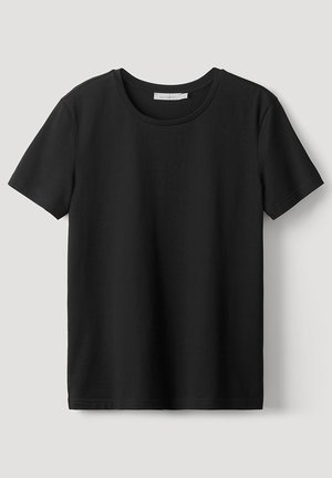 Schwarzes Crew-Neck-T-Shirt aus weichem Stoff. Kurzärmlig, lockere Passform und schlichtes Design ohne Muster oder Akzente.